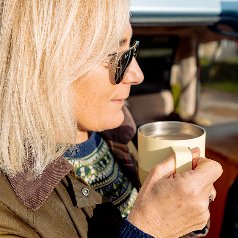 12oz-rise-mug-b2 12oz_rise_coffee_mug_wax_yellow_woman_drink_closeup_square.jpg