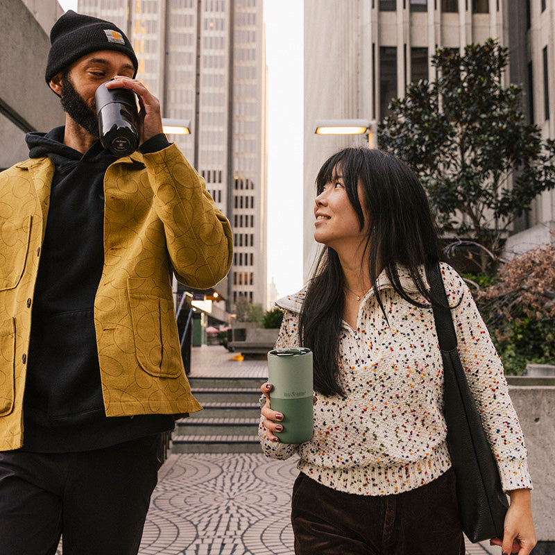 bring-your-own-party-kit-pints-and-tumblers-o2 16oz_rise_tumbler_black_iceberg_couple_drink_city_street_square.jpg