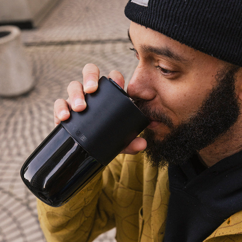 daily-on-the-go-set-x9 16oz_rise_tumbler_black_man_drink_square.jpg