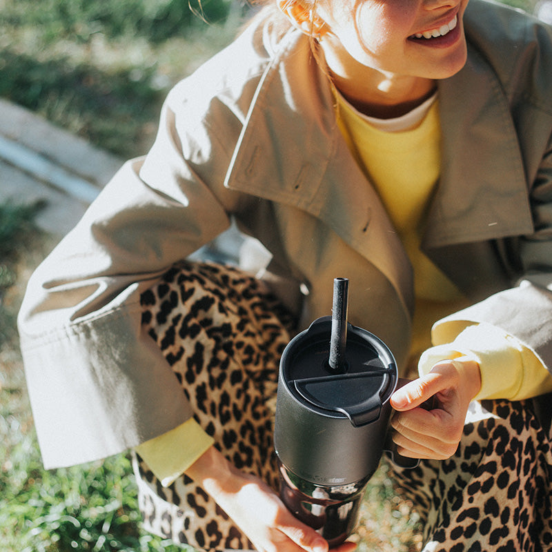 26oz-rise-tumbler-with-straw-lid-x6 26oz_rise_tumbler_black_woman_topview_square.jpg