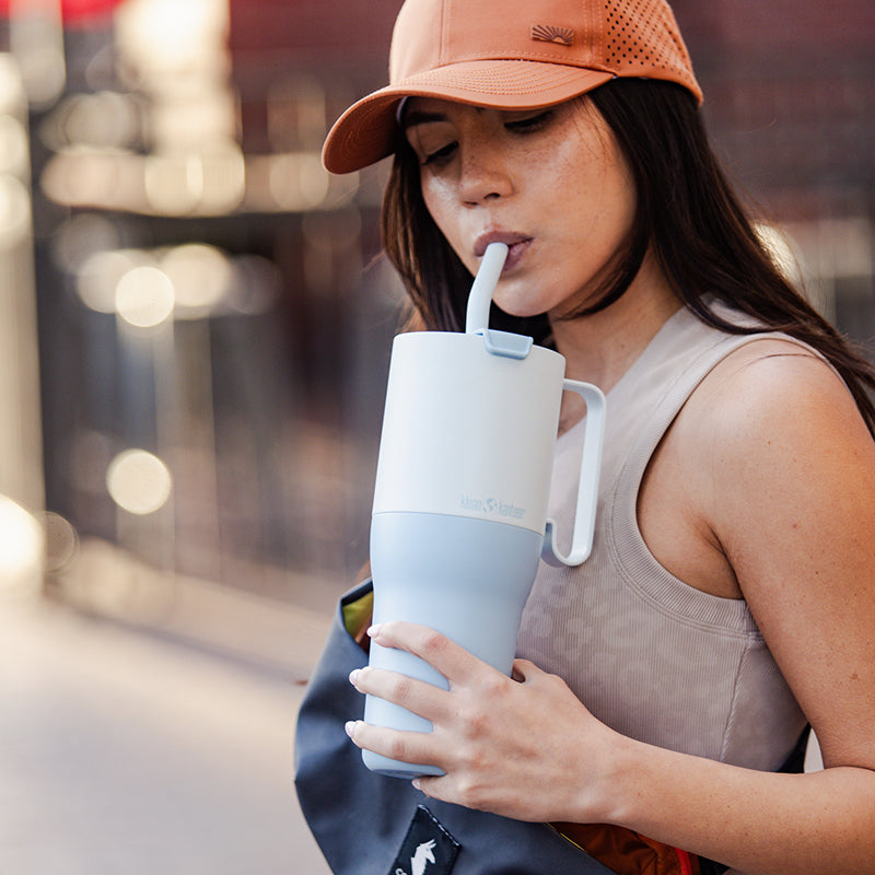 36oz-rise-tumbler-with-straw-lid-v6 36oz_rise_tumbler_straw_girl_sip_square.jpg