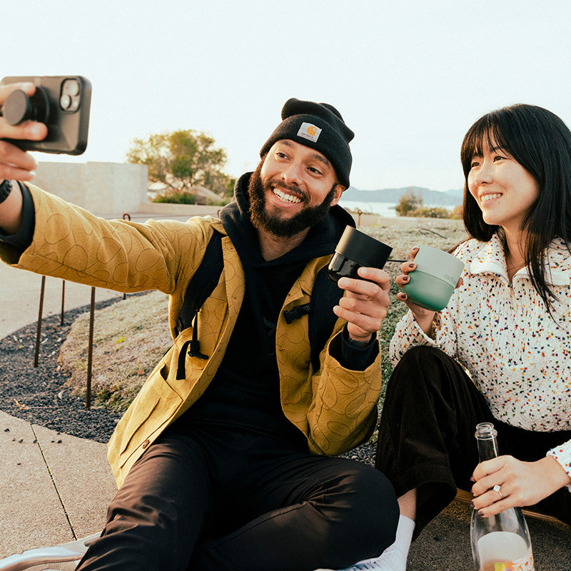 8oz-rise-lowball-tumbler-g8 8oz_rise_lowball_black_iceberg_couple_selfie_city_square.jpg