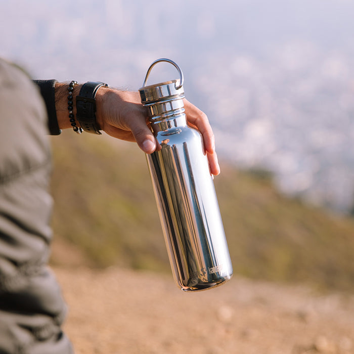 27oz-reflect-with-bamboo-cap-t3 K27SSLRF-MS-BAMBOO_reflect_bottle_hand_lifestyle.jpg