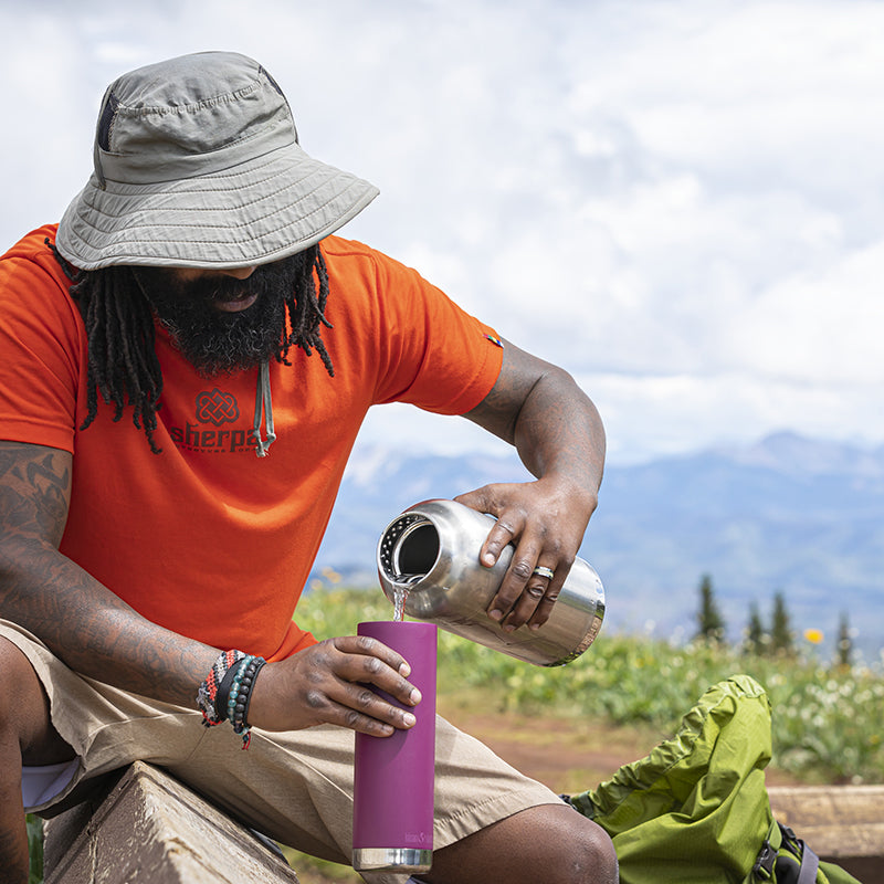 64oz-tkwide-with-loop-cap-v7 tkwide_64oz_bottle_backpacker_mountains_filling_square.jpg