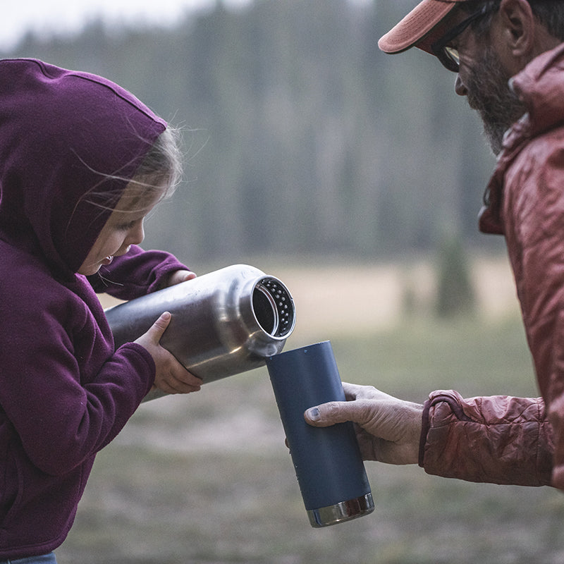 64oz-tkwide-with-loop-cap-v7 tkwide_64oz_bottle_girl_dad_filling_square.jpg